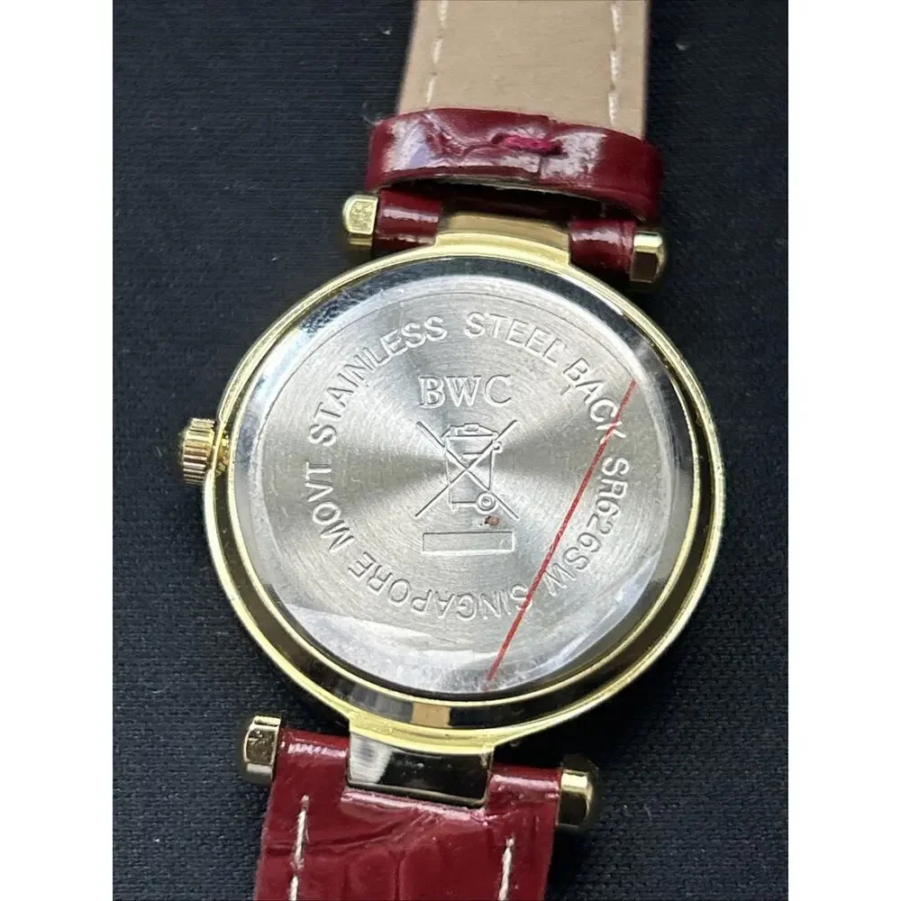 Gold Tone Red Dial And Band Women’s Quartz Watch